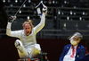 Eva Andrea Hajmasi reacts after winning a wheelchair fencing bout to win foil team bronze for Hungary on Aug 29. [Photo/Agencies]