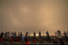 2022年5月10日凌晨，海南文昌，民众观看长征七号遥五运载火箭点火升空。