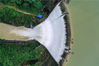 2022年5月24日，无人机航拍广西桂林市全州县源口水库溢洪瀑布景观。