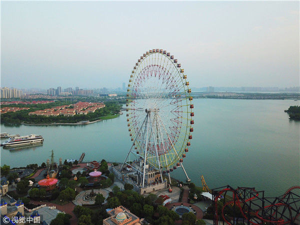 航拍蘇州金雞湖摩天輪夕陽遠眺東方之門格外壯美