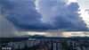 2022年6月30日，海南省琼海市万泉河上空乌云翻滚雷雨阵阵。