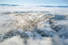 2023年3月13日，在贵州省毕节市威宁自治县城拍摄的雪后云海美景。