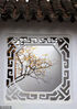 2024年1月8日，苏州园林狮子林含苞蜡梅与古典花窗相映成景。来源：视觉中国


